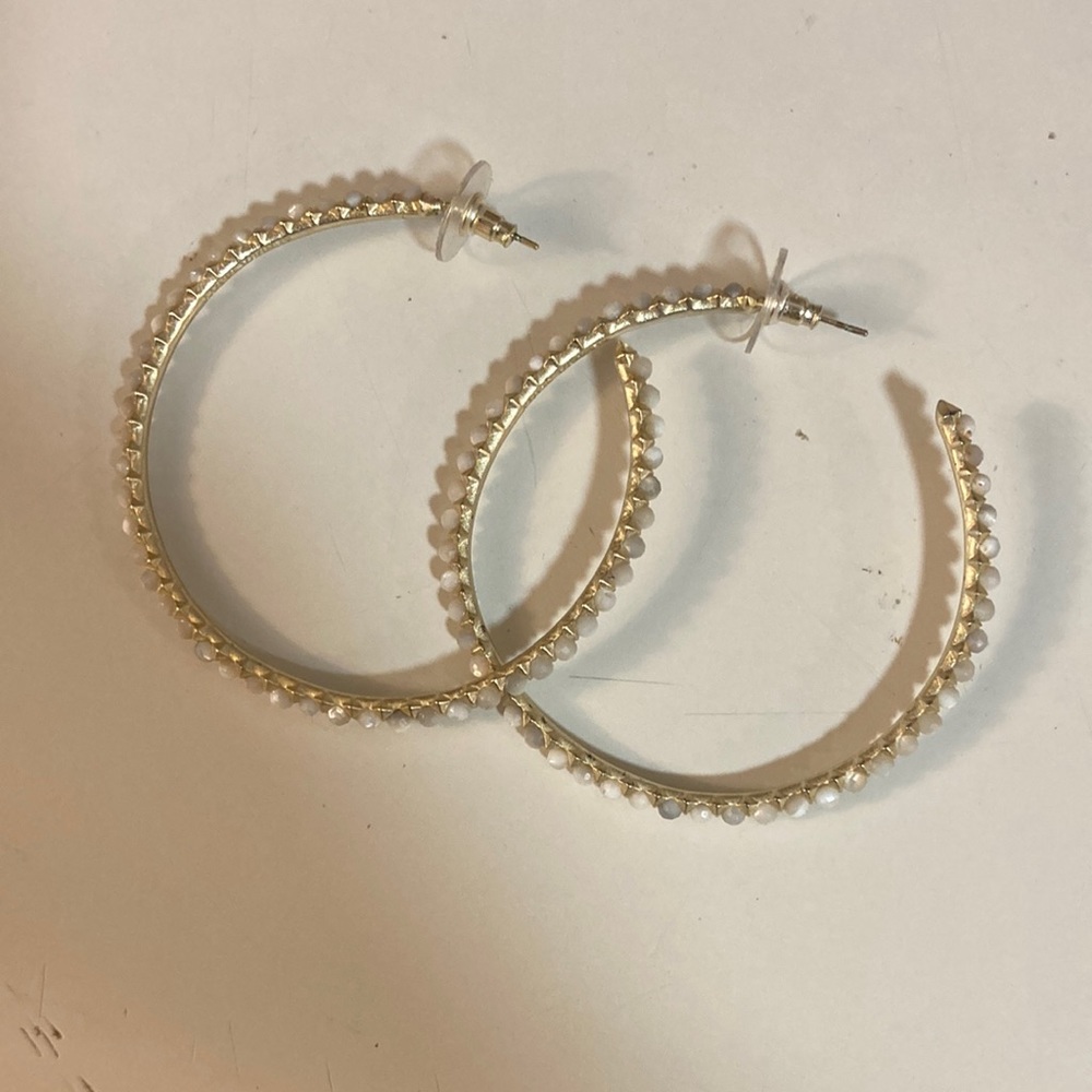 Gold and white Kendra Scott hoop earrings